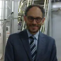 A person wearing glasses Description automatically generated with medium confidence