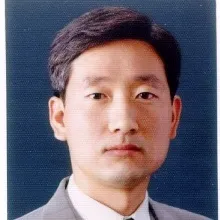 A picture containing text, necktie, person, clothing Description automatically generated